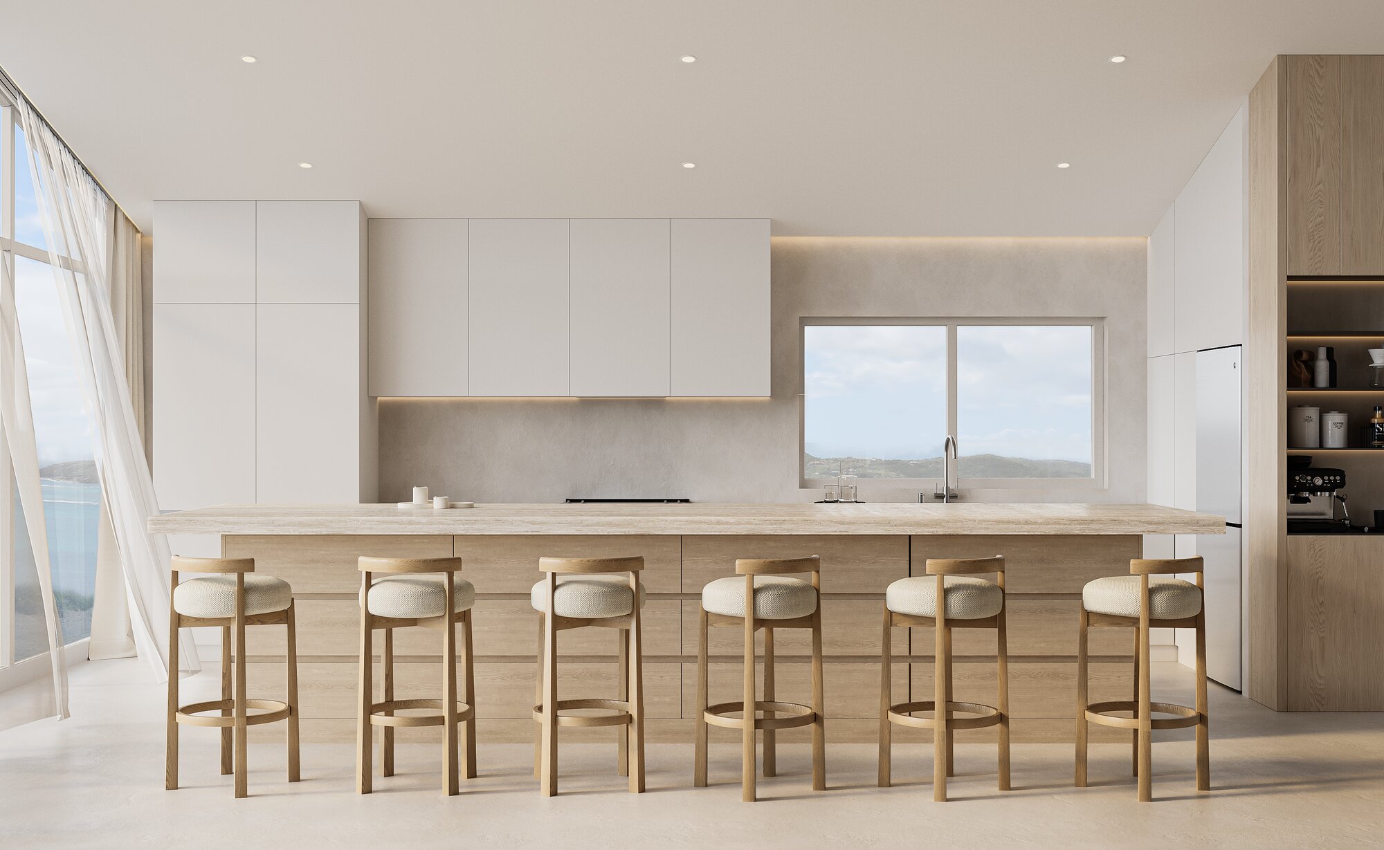Long stone-topped kitchen island with bar seating
